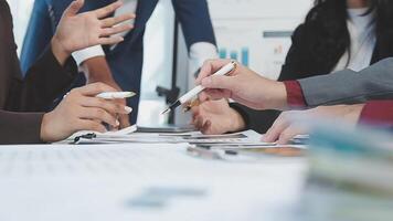 Business people working together at a table video