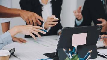 Business people working together at a table video