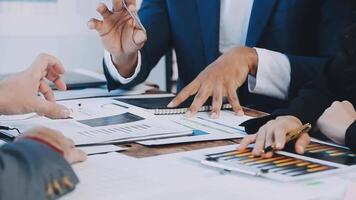 Business people working together at a table video
