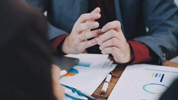 Business people discussing business strategy video