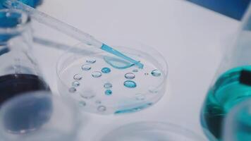 A close up of a laboratory with a test tube and liquid video