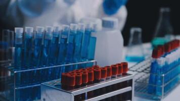 A laboratory with many test tubes and bottles video