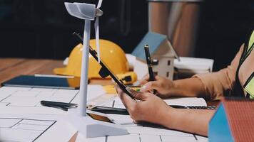 A person is working on a project with a pencil and a notebook video