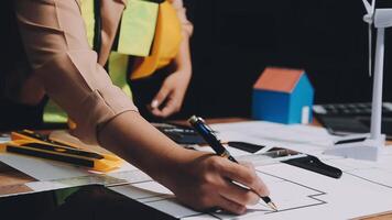 A person is working on a project with a pencil and a pen video