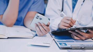 A doctor is using a tablet and a pen to write on a clipboard video