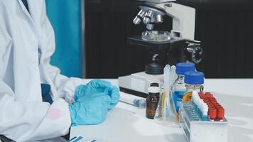 A person in a lab coat is working on a test video