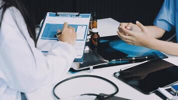 A doctor is talking to a patient video