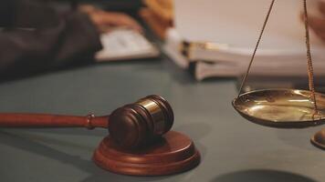 Lawyer and gavel on desk video