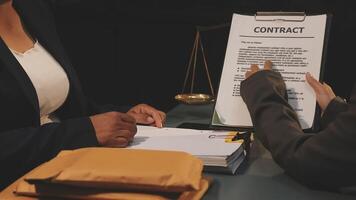 Two business people are signing a contract video