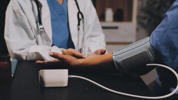 A doctor is checking the blood pressure of a patient video