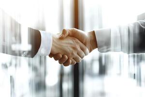 Business professionals shaking hands in the office, symbolizing collaboration, partnership, and teamwork in a professional setting photo