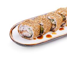 Savory sushi rolls served with sesame seeds and sauce on a rectangular plate photo