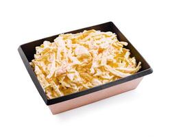Deliciously shredded cabbage salad prepared in a black serving container ready for a meal or side dish photo