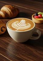 Smooth Coffee With Latte Art and Delicious Pastries Nearby photo