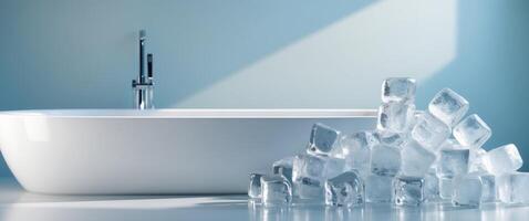 Bathtub filled with ice cubes in a serene bathroom setting featuring a calming blue background and elegant design photo