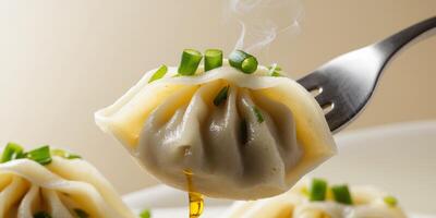 Close Up of Delicious Dumplings on a Fork. photo