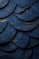 Overlapping blue stone tiles creating a textured pattern photo