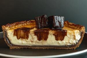 A decadent slice of chocolate cheesecake tart photo