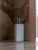 Modern bathroom with soap dispenser on marble counter photo