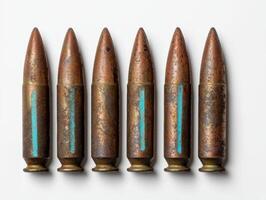 Ammunition rounds in a row on a white background photo