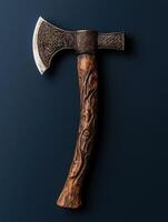 A decorative battle axe with intricate carvings photo