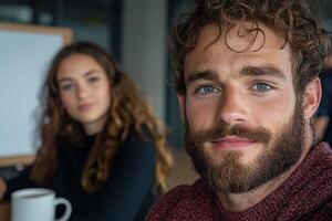 Portrait of a man with a beard and a woman in the background photo
