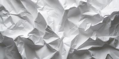 Textured background of crumpled and folded paper forming an abstract design photo