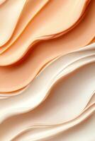Swirls of beige and orange cream create an abstract background photo