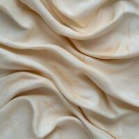 Elegant beige fabric with subtle marble pattern and soft draping photo