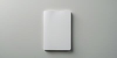 blank notepad mockup on gray background. photo