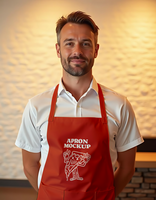 A man with a smile wears a red apron with a pizza graphic and the words Apron Mockup psd