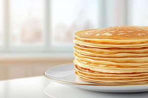 Pancakes on porcelain plate on white countertop, with copy space photo