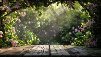 Wooden table in the garden with flowers photo