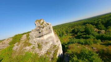 Cinematic FPV flight through a hole in the limestone rock in Poland video
