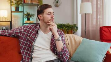 Thoughtful man suffers from unfair situation problem break up depressed feeling bad annoyed burnout video