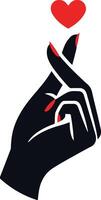 a hand with a red heart vector