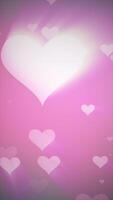 A soft pink background with glowing floating hearts, creating a dreamy and romantic atmosphere. love-themed designs, and wedding visuals video