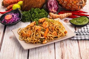 A plate of food on a table photo