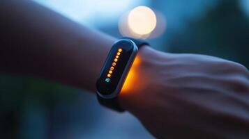Illuminated fitness tracker displaying steps count photo
