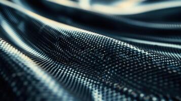 Close up of carbon fiber texture in wavy pattern photo