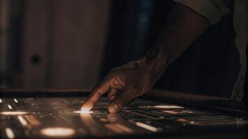 A closeup of a hand hovering over a holographic screen with data points illuminating and expanding as it approaches highlighting the intuitive user interface.. photo