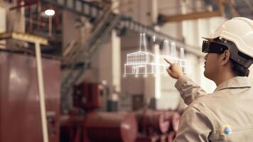 A technician uses augmented reality glasses to view a holographic representation of the supply chain with key performance indicators and alerts floating beside machinery on the. photo