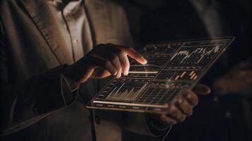 An exeive using hand gestures to manipulate a lifelike holographic interface displaying key performance indicators and strategic metrics showing the seamless interaction between. photo