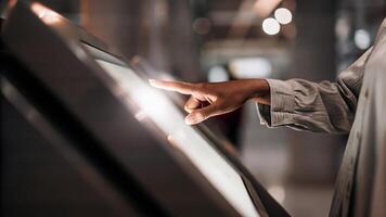 A closeup of a customers hand reaching out to touch a holographic product feature the interface lighting up in response signifying an intuitive and interactive shopping journey.. photo