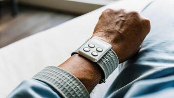 An intricate view of a wearable wristband designed for neurofeedback training adorned with sensors and a digital readout highlighting its portability and accessibility in brain. photo