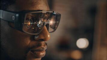 A closeup on a focused employee wearing augmented reality glasses immersed in a holographic training module that provides interactive learning experiences.. photo