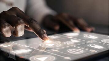 A closeup of a hand interacting with a holographic keyboard with translucent letters and numbers appearing as they type set against a backdrop of an ultramodern conference room.. photo