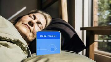 A serene face of an elderly person resting against a pillow with a sleep tracker visible as soft morning light filters in signaling the end of a night filled with tracked sleep. photo