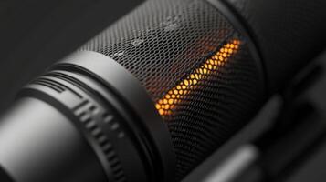 An intricate closeup of the shotgun mics mesh grille showing detailed textures with focus on its precise pickup pattern indicator and the attached XLR cable highlighting its professiona photo