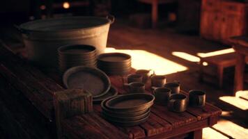 Rustic pottery and utensils displayed in a warm wooden setting video